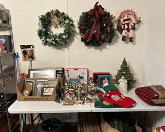 Christmas Wreaths, Vintage Ceramic Christmas Houses, Vintage Ceramic Christmas Tree, and picture frames. 