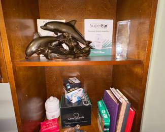 Dolphin statue, note books, letter openers and more