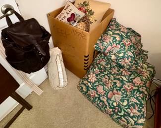 Decorative pillows, bedding, backpack