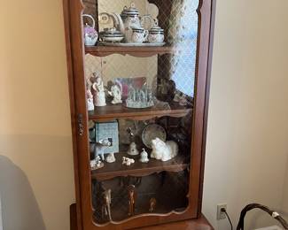 Curio with storage. Has one faded spot on right corner. Can zoom in to see. Other than that, perfect condition. $325
16d x 28w x 74t
Items inside will be priced for in person sale