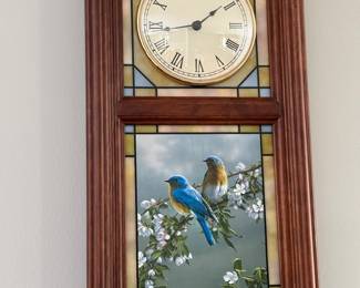 Fun wall clock with interchangable seasons stained glass panels 