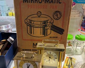brass clocks and mirro matic