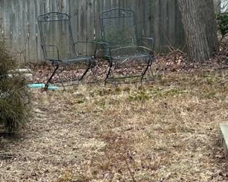 set of four wrought iron patio chairs