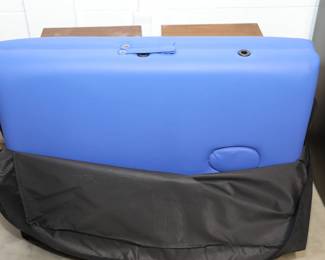 Folding massage table