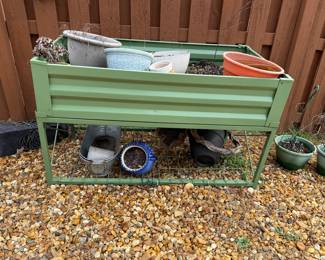 #56 Raised metal planter 47x44x27 with dirt $40.00