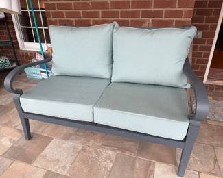 #45 Aluminum loveseat with sunbrella cushions 54" L $200.00