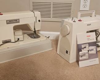 Two sewing machines and many sewing and needlepoint supplies.