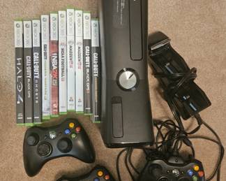 XBOX 360 full gaming console, controllers and miscellaneous games