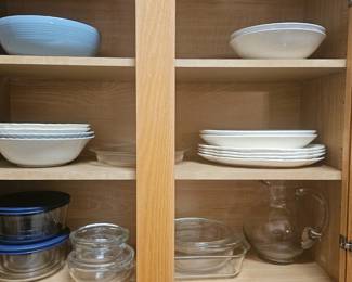 Various kitchen pots and pans, dishes bakeware and containers.