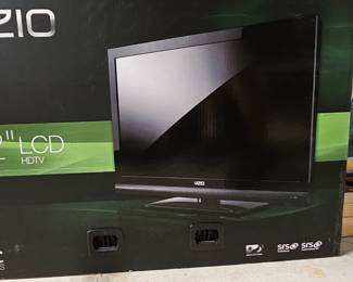 Two different tv's including Vizio and Samsung