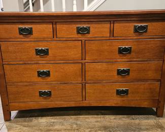 Modern bedroom set includes twin headboard, footboard and wood rails, box springs, dresser and mirror, nightstand, and desk with hutch.