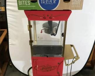 207 - Movie Time Theatre Popcorn Machine
Made by Nestalgia and is 2 pieces - popcorn machine sets on top of a rolling cart and measures 24" x 15" x 59" tall. Supplies included are popcorn, oil and cups for the popcorn.