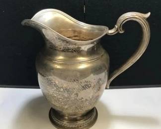 63 - Rogers Sterling Silver Pitcher 4 1/8 Pints
Pitcher weighs 594 grams of Sterling Silver.
