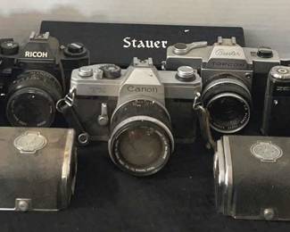 5 Vintage Cameras Kodak, Ricoh, Canon, Beseler Topcon, Zenit Moshiva, Film holders, Stauer Watch