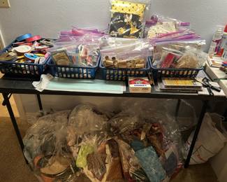 Grab bags filled with sewing notions. 