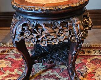 Deeply carved low Chinese marble top table in rosewood