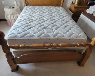 Queen Bed With Oak Headboard And Footboard. Mattress Is Like Brand New Includes Boxspring