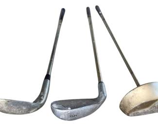 Three Golf Clubs