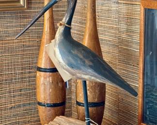 VIntage juggling pins and a handsome wood carving by local artist Wayne Baker!
