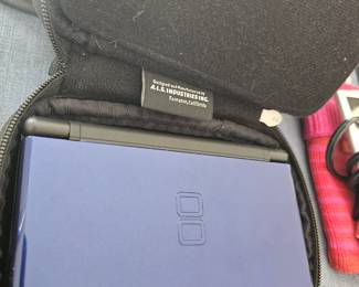 Nintendo DS with case & games (tested)