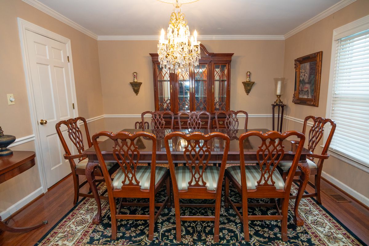 8 Chairs ALREADY SOLD — Still Available items included: Chippendale Style Cherry Dining Table & Matching China Cabinet — Dining room TABLE Dimensions: 68 long without leaf x 83 long with one leaf x 42 1/2 wide 30 tall — Dining room CHINA CABINET Dimensions: 86 1/4 tall x 64 wide x 18 1/2 deep x Top 16 deep