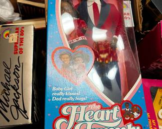 #199	Mattel the heart family kiss and cuddle  dad and baby black 	 $20.00 			
