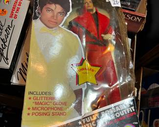 #182	Michael Jackson action figure glittering glove mic, posing stand red leather	 $20.00 			
