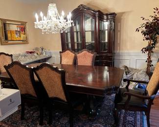 #34	heavy dining table 72-108x45x30nwith double trussell and 6 chairs 2 leaves (as is seat of chairs 	 $275.00 			
