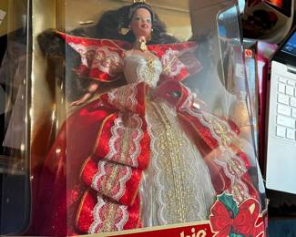 #210	Holiday barbie 1997 brunette barbie	 $25.00 			
