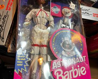 #203	Barbie Astronaut barbie with glow in dark moon rock (Africa American)	 $20.00 			
