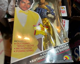 #186	michael jackson action figure Grammy award outfit glove, mic, stand	 $20.00 			
