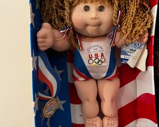 #305	Doll-br1	cabbage patch doll olymikids blonde braids 1996 	 $20.00 			
