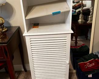 #55	white painted cabinet with 1 door and shelf 19x13x48	 $75.00 			
