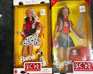 #215	101 Dalmatians Barbie Blonde Brunette dolls	 $20.00 			
