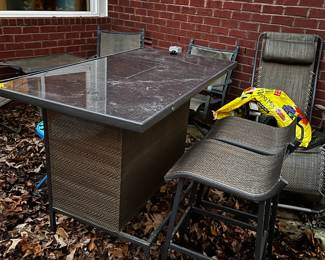 #317	Patio	bar with metal and wicker glass top 2 bar stools	 $100.00 			
