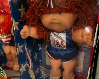 #300		cabbage patch doll olymikids bright red head	 $20.00 			
