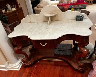 #6	Antique marble top server with back splash and 1 drawer 53x28x30	 $350.00 			
