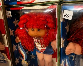 #302	cabbage patch doll olymikids red head braids 	 $20.00 			
