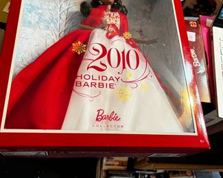 #209	Holiday barbie 2010 African American 	 $20.00 			
