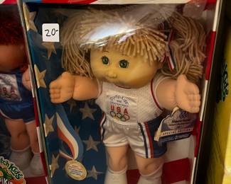 #298	cabbage patch doll Olymikids blonde with shorts/tank	 $20.00 			
