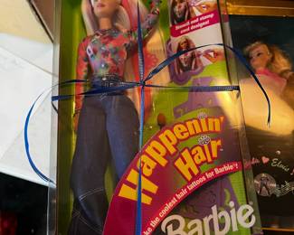 #202	barbie Happening hair blonde barbie and brunette Teresa dolls	 $30.00 			
