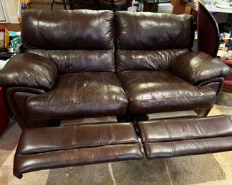 #24	double recliner brown leather sofa as is lift of recliner 74 wide as is arm	 $275.00 			
