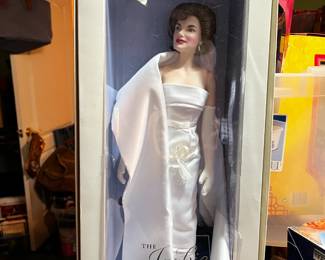 #159	Jackie O Doll 	 $20.00 			
