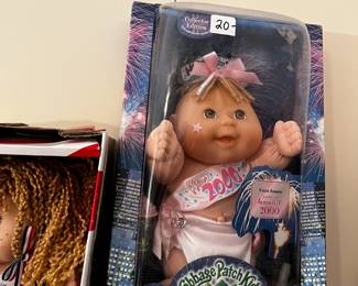 #306	cabbage patch doll Millennium celebration baby 2000	 $20.00 			
