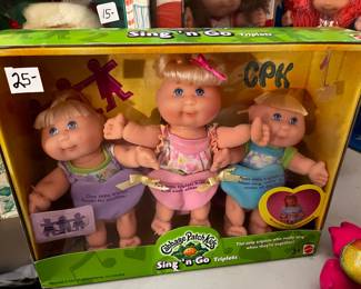 #308	cabbage patch doll sing and go triplets 	 $25.00 			
