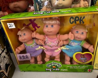 #296	cabbage patch dolls Sing and go 3 dolls 	 $25.00 			
