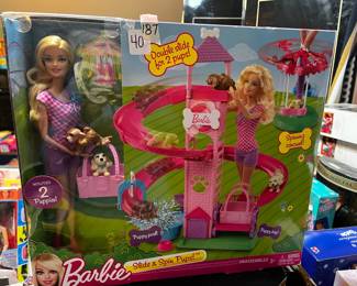 #185	Barbie slide and spin pups double slide with 2 pupies 	 $40.00 			
