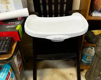 #129	Eddie Bauer Laminate Black Highchair	 $30.00 			
