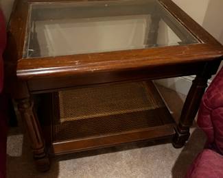 #15	glass top end table with wicker shelf on bottom as is finish	 $35.00 			
