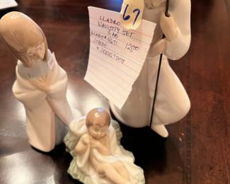 #67	lladro nativity set 3 pc Mary 4671 Joseph and Jesus 5478  8 inch tall 	 $125.00 			
